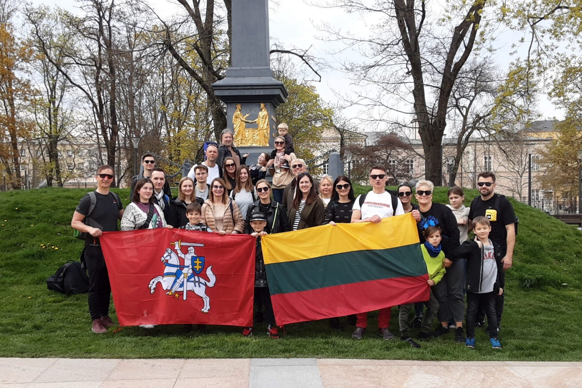 Martin's City Tours, a group of Lithuanian tourist in front of The Union of Lublin Monument during one of our Lublin Private Tours.